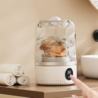 ThiccFitts portable underwear washer on bathroom counter with clear lid, digital timer, and delicates washing inside while a user presses the power button.